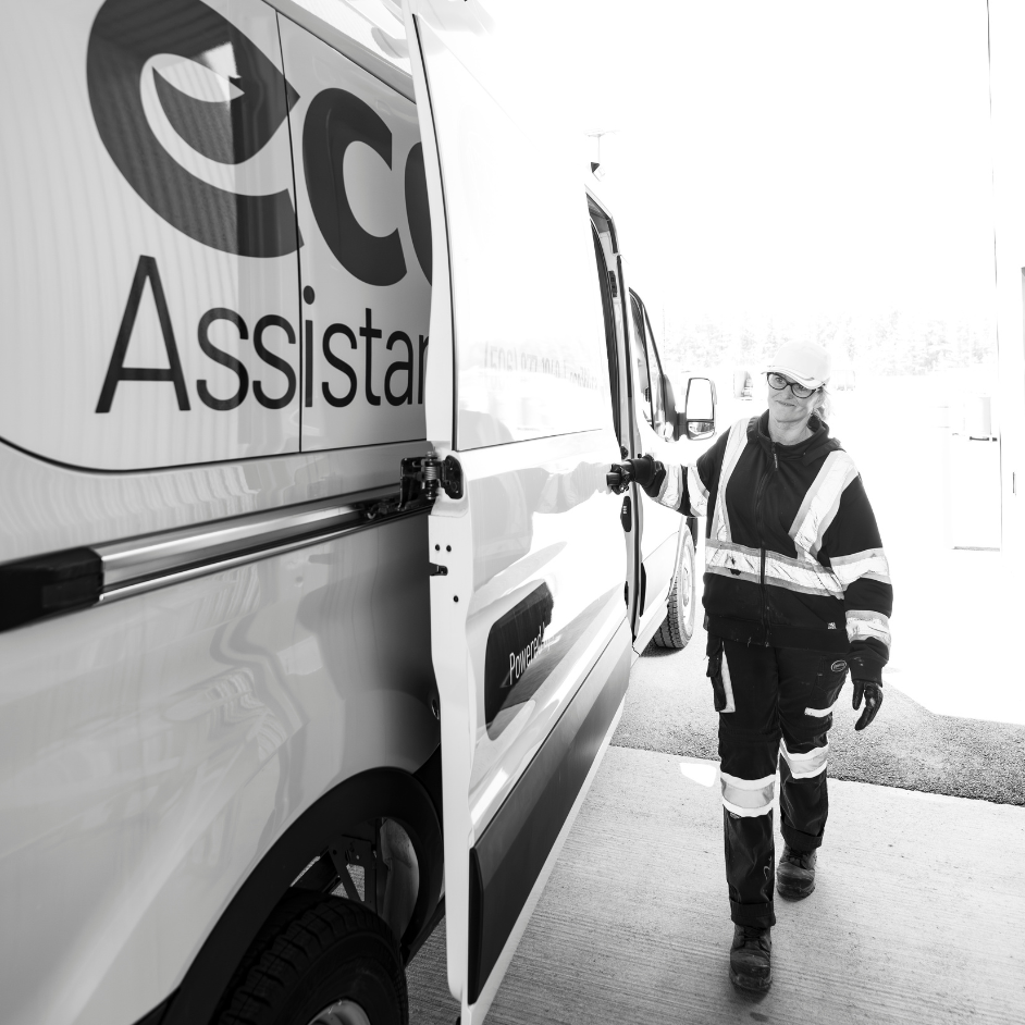 Person Closing the Door of the Eco Assistance Program Vehicle